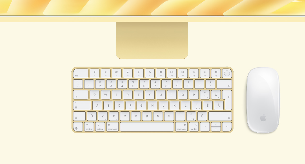 iMac, couleur jaune, vue du dessus, avec Magic Mouse et Magic Keyboard avec Touch ID