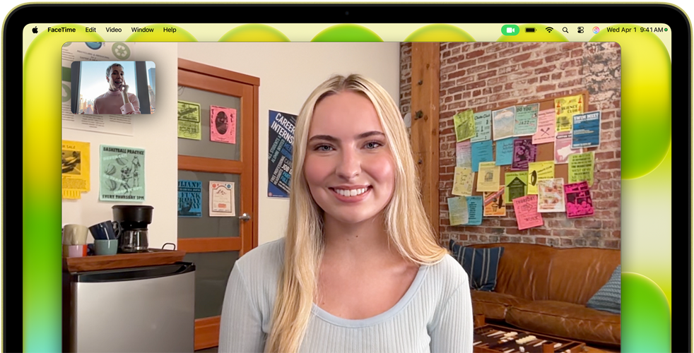 MacBook Neo, värinä sitrus, näytön yläpuolella sijaitseva kamera, näytöllä FaceTime-videopuhelu