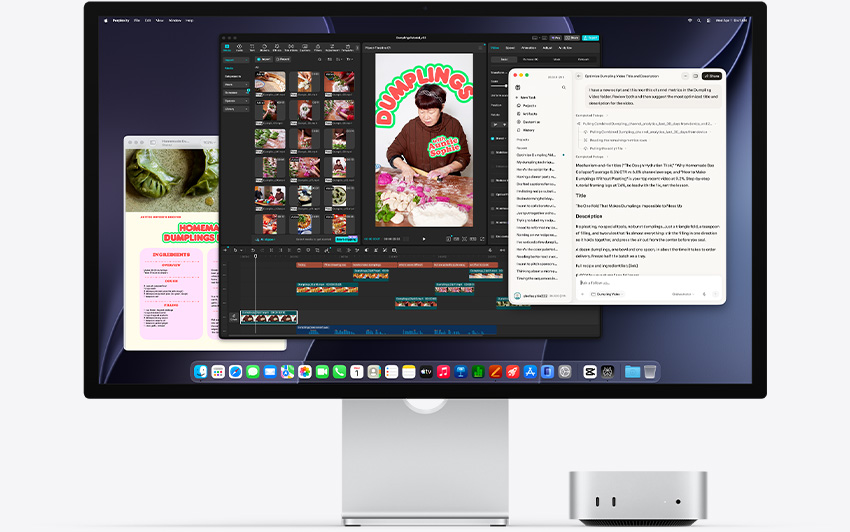 Bagian depan Mac mini, terselip di bawah Studio Display, aplikasi DaVinci Resolve berjalan di lingkungan macOS