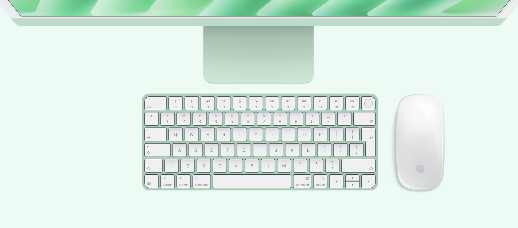 Overhead view of green iMac with color-matching mouse and keyboard