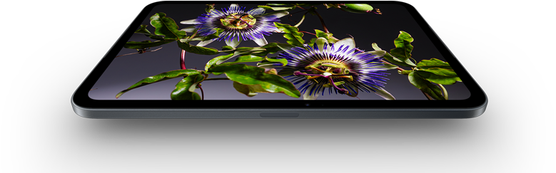 iPad mini, 8.5-inch OLED display, bright and deep blacks, showing a person wearing a hat and jacket