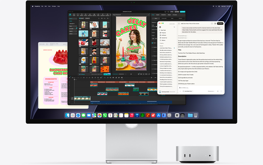 الجهة الأمامية لجهاز Mac mini، موضوع تحت شاشة Studio Display، شاشة تعرض برامج Perplexity Personal Computer وCapCut وPages وهي تعمل في بيئة macOS‏