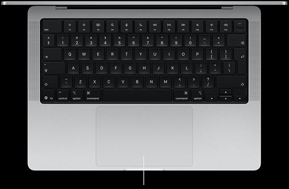 MacBook Pro, silver color, open, showing keyboard and Force Touch trackpad