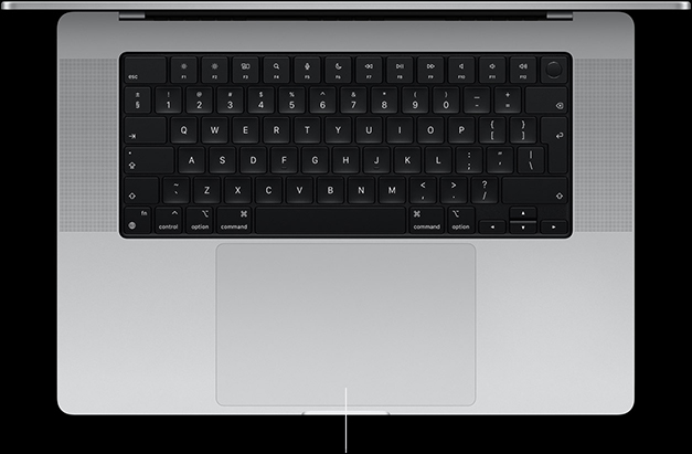 MacBook Pro, silver color, open, showing keyboard and Force Touch trackpad