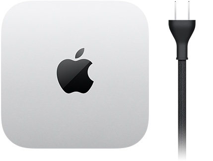 Mac mini 的俯視圖，展示銀色鋁金屬機身、方形圓角設計，以及機身中央的黑色亮面 Apple 標誌、附有兩孔電源插頭的黑色電源線