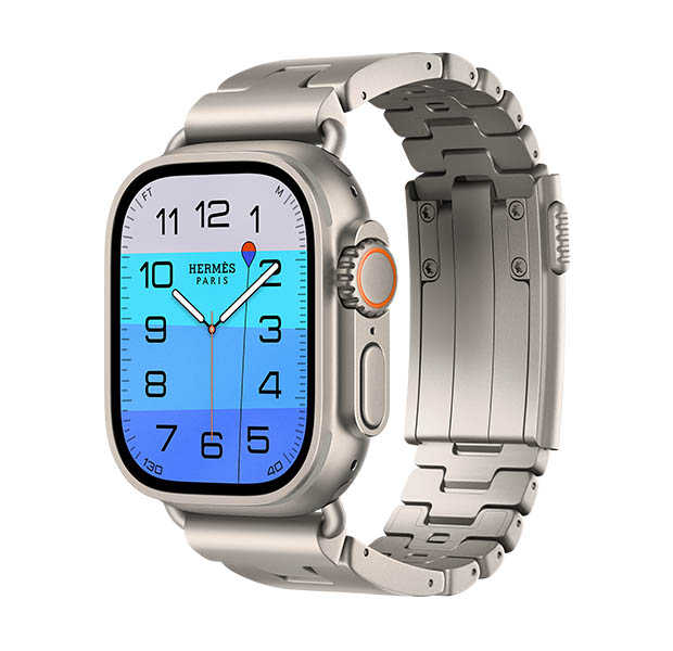 Apple Watch Hermès Ultra 4, Fathom and Wonder analog watch face (hour, minute, and second hands, Depth complication, with a diver swimming downwards through a sea with a gradient from light to dark blue), titanium case, natural color, right side exterior, Digital Crown, raised side button, paired with Grand H Titane band, Gris Titane color