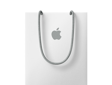 En hvid Apple Store-shoppingpose med gråt Apple-logo og grå håndtag