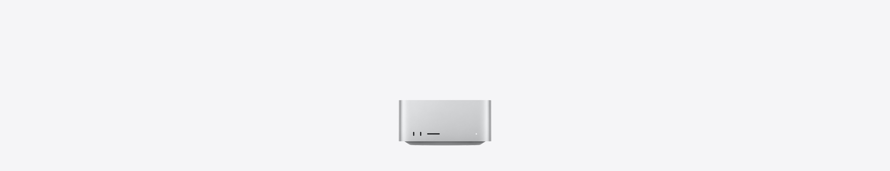 Mac Studio, front, two USB-C ports, SDXC card slot, status indicator light, tapered base at bottom, flat top, rounded sides, straight edges, silver colour