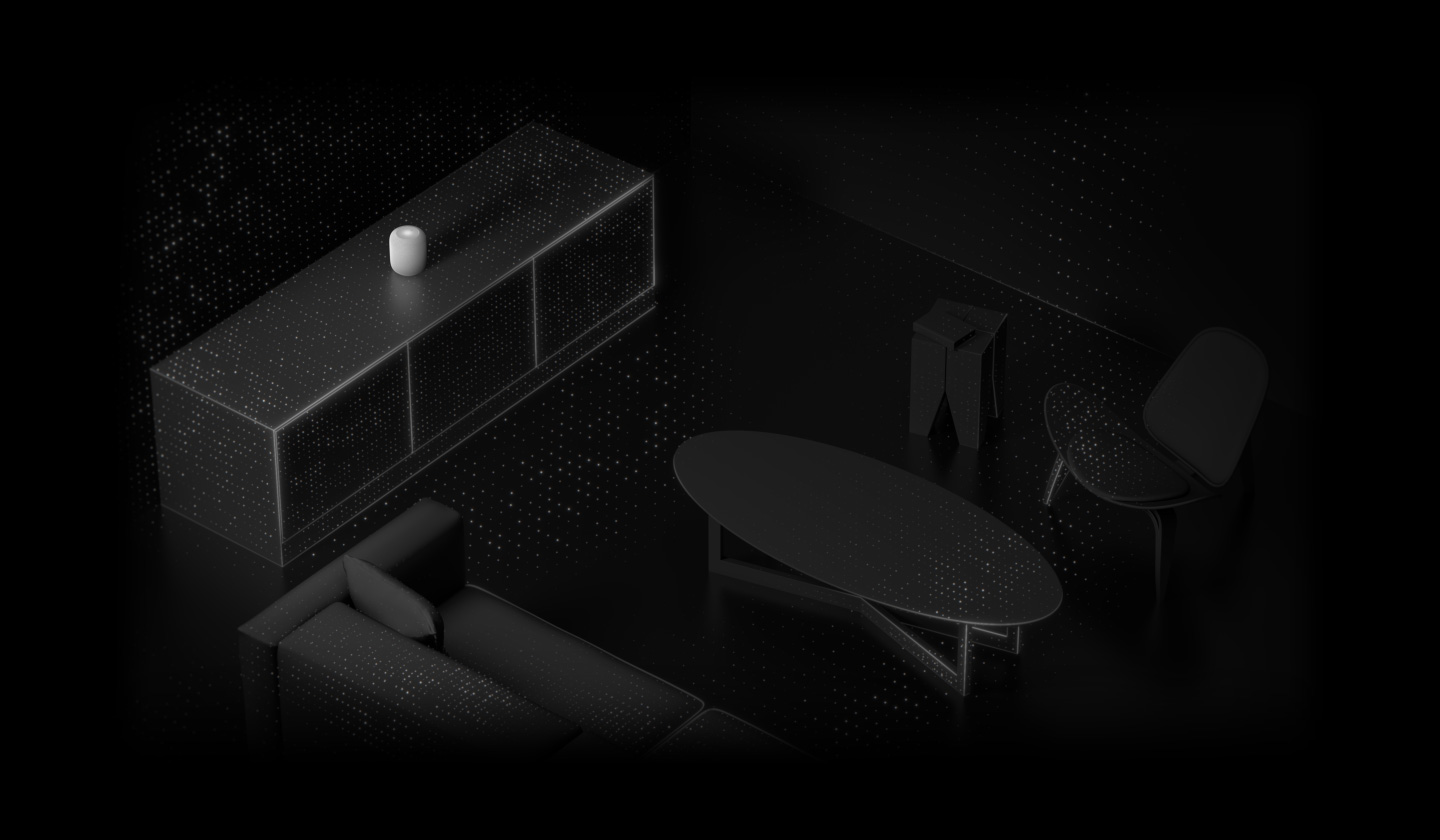 Visuaalinen esitys tilaäänestä, lintuperspektiivistä kuvattu HomePod, josta säteilee äänipartikkeleista muodostuvia väreileviä renkaita.