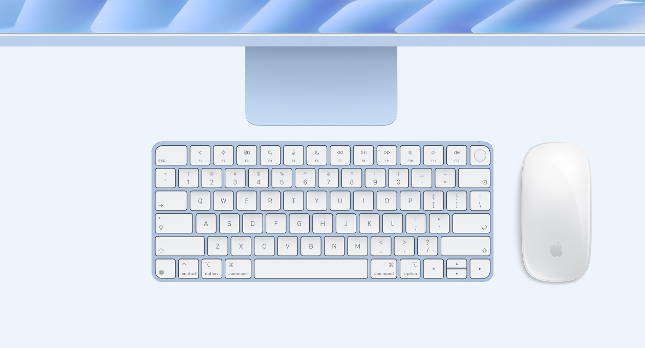 iMac i blå vist ovenfra med Magic Mouse og Magic Keyboard med Touch ID