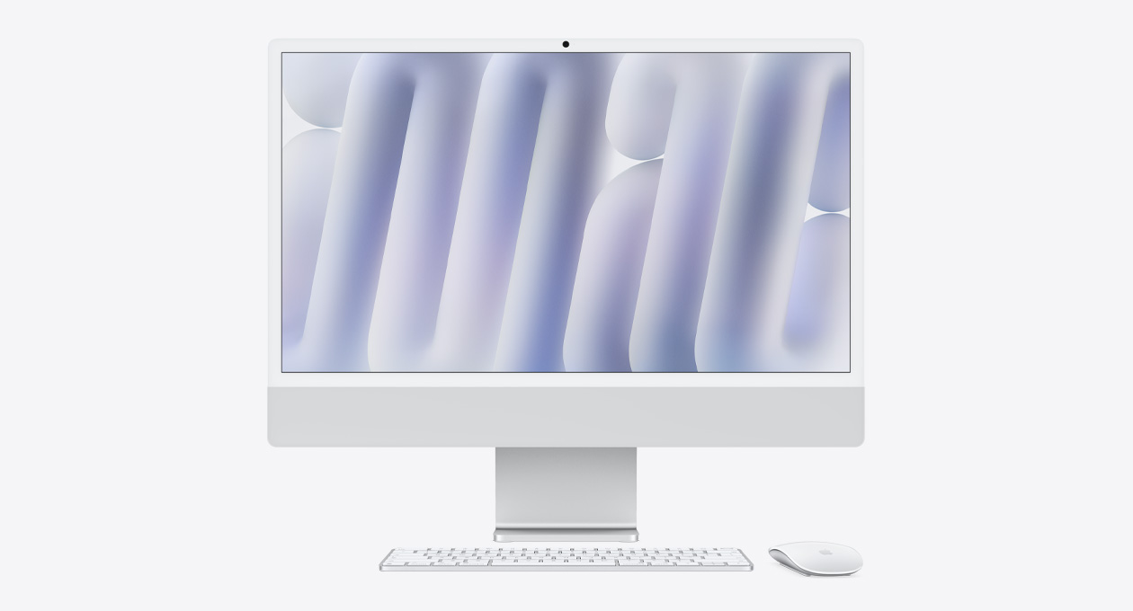 Sølvfarvet iMac vist forfra med Magic Mouse og Magic Keyboard i matchende farver