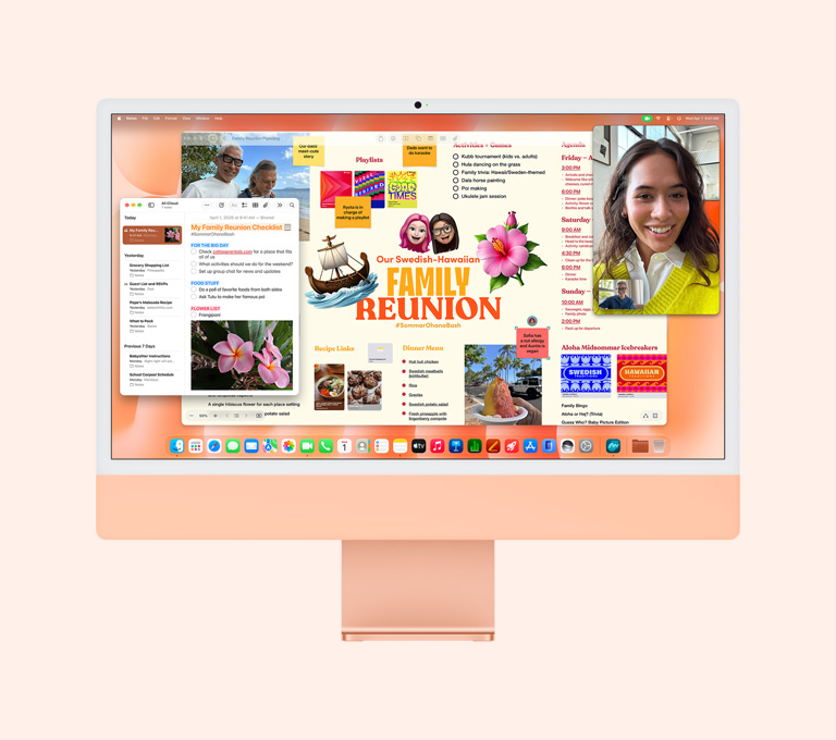 橙色 iMac，機身正面，螢幕顯示一個人正在進行 FaceTime 通話，以及家庭聚會計劃板和備忘錄 app