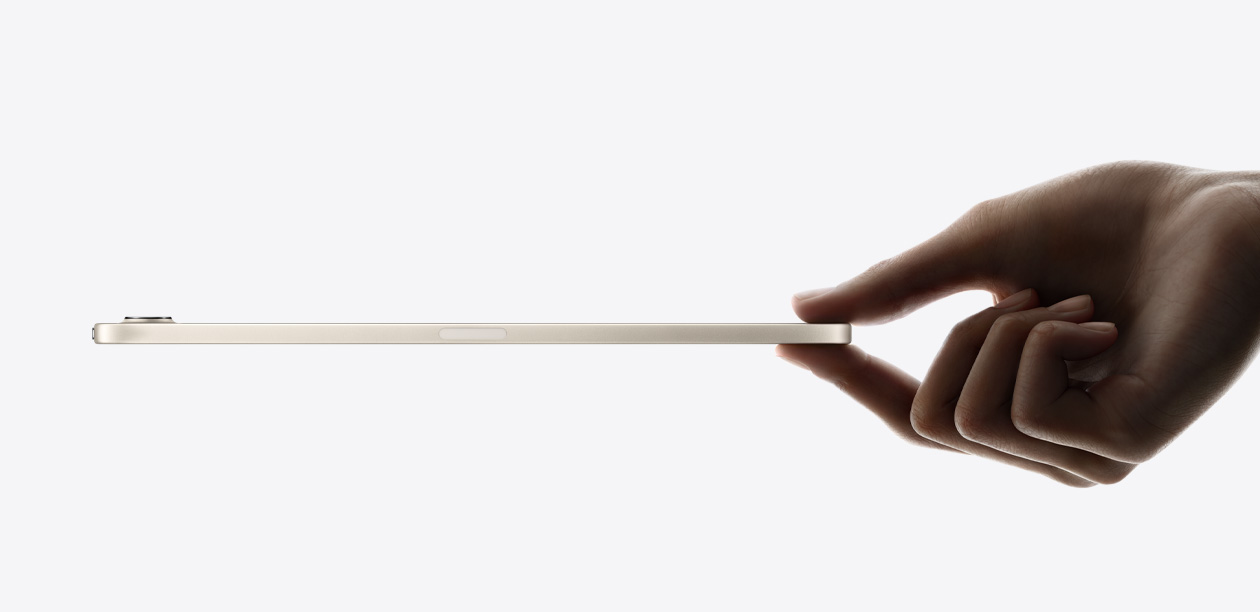 iPad mini, side view in Starlight color, thin and light design.