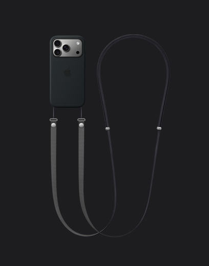 Vista traseira do iPhone 17 Pro prateado, com Capa em silicone preta com MagSafe e fita Crossbody em cinzento‑escuro colocada